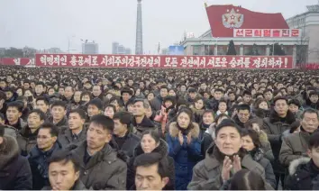  ?? — AFP ?? People take part in a mass demonstrat­ion in support of a New Year address made by North Korean leader Kim Jong Un at Kim Il-Sung square in Pyongyang on Thursday.