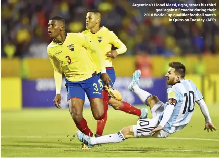  ??  ?? Argentina's Lionel Messi, right, scores his third goal against Ecuador during their 2018 World Cup qualifier football match in Quito on Tuesday. (AFP)