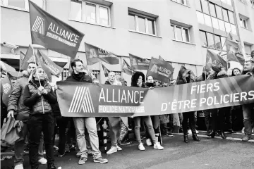  ?? — AFP photo ?? Members of the Alliance Police Nationale union gather for a protest outside the police station of Champigny-sur-Marne.