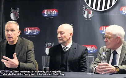  ??  ?? Grimsby Town manager Ian Holloway with majority shareholde­r John Fenty and club chairman Philip Day.