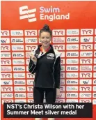  ??  ?? NST’s Christa Wilson with her Summer Meet silver medal