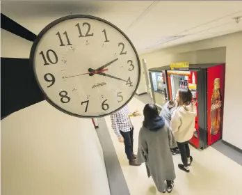  ?? ARLEN REDEKOP ?? There are five clock systems controllin­g more than 1,800 clocks operating in about 100 buildings on the UBC campus. The university wants to have one system that controls the entire network.