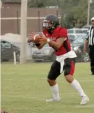  ?? The Sentinel-Record/James Leigh ?? ■ Cutter Morning Star quarterbac­k Lashawn Jones (5) takes the snap during last week’s game against Little Rock Hall at Eagle Field.