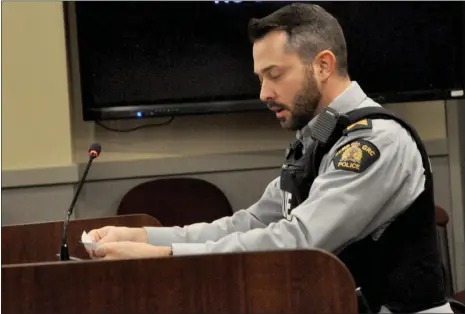  ?? ?? Staff Sgt. Evan Gordon presents the quarterly community policing report during a regular City council meeting, Jan. 9.