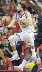  ?? David J. Phillip Associated Press By Dan Woike ?? STEPHEN CURRY is averaging 17 points a game in the West finals while making only two of 13 three-point attempts.