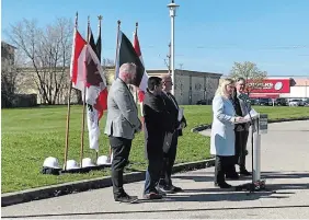  ?? LUISA D’AMATO METROLAND ?? Kitchener South-Hespeler MP Valerie Bradford speaks as the City of Kitchener announces it will donate a strip of land in Stanley Park for affordable housing to be built. The land in question is behind the speakers. From left: Philip Mills, CEO of Habitat for Humanity; Kitchener Coun. Paul Singh; Kitchener Mayor Berry Vrbanovic; Waterloo MP Bardish Chagger (partially visible) and Kitchener-Conestoga MP Tim Louis.