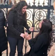  ??  ?? Below: Chrissy (on the right) proposes to Bria. Bottom: the couple at an event in California in 2016