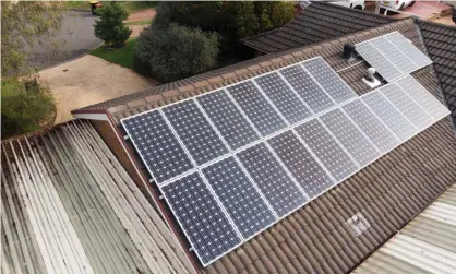  ?? ?? Solar energy provided 12.3% of all electricit­y generated over 2021, nearly two-thirds of that from rooftop panels. Photograph: Carly Earl/ The Guardian