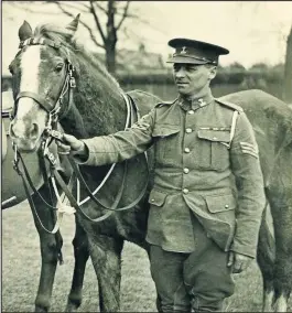  ??  ?? Trooper Bert Main is pictured with Songster, Loughborou­gh’s very own war horse. CNF