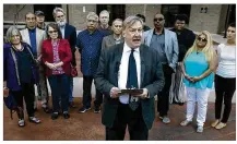  ?? RALPH BARRERA / AMERICAN-STATESMAN ?? Attorney Fred Lewis meets with the media Wednesday to discuss a lawsuit filed by three people who want a state judge to require Central Health to spend taxpayer-approved funds for Dell Medical School on indigent health care.