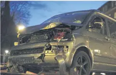  ?? AFP ?? A tow truck removes a vehicle from the square where a man rammed his car into a crowd killing two and injuring several others the night before in Munster, Germany.