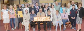  ??  ?? Members of Book Clubs in Louth with Yvonne O’Brien, Louth County Librarian, Sarah Daly, Creative Spark, Cllr. Liam Reilly, Chairman, Louth County Council, Author, Michael Harding, Paul Hayes, An Táin Theatre and Cllr. Maria Doyle at the official launch of the Wee County Big Book Club in Dundalk Library.