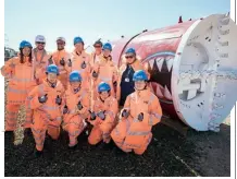  ?? ?? LIZZIE GETS TO WORK: Named after the Queen by Year 8 students (pictured) from The Misbourne School in Great Missenden, miniature Tunnel Boring Machine (TBM) Lizzie will create a 300m length of drainage tunnel close to the northern portal of HS2’s Chiltern tunnel. The 8.9m-long TBM will excavate and line the tunnel with 120 concrete jacking pipes, working at a pace of around 5m per day. An identical machine named Marsha, after gay and transgende­r rights activist Marsha P Johnson, will work on a further 450m of the drainage tunnel. HS2