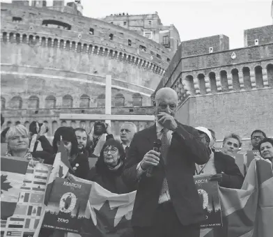  ?? GREGORIO BORGIA / THE ASSOCIATED PRESS ?? Sex abuse survivor Peter Isley speaks at a vigil prayer in Rome Thursday. Pope Francis opened a sex abuse prevention summit by warning senior Catholic figures the faithful are demanding concrete action against predator priests.
