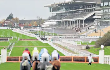  ??  ?? Wall of silence: A view of empty stands awaits jockeys during the Cheltenham Festival this week