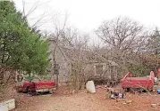  ?? ASSESSOR PHOTO] [OKLAHOMA COUNTY ?? Property records show a house in the woods near Arcadia, where a man described as a recluse lives.