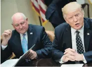  ?? BRENDAN SMIALOWSKI / AFP / GETTY IMAGES ?? U.S. Secretary of Agricultur­e Sonny Perdue with U.S. President Donald Trump, who has suggested Canada has been “very rough on the United States” on trade.