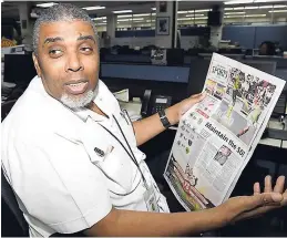  ??  ?? President of Boys’ Town Football Club Leon Mitchell makes a point while going through the pages of The Gleaner’s Sports section during an interview recently at the Gleaner Company (Media) Limited’s North Street offices.