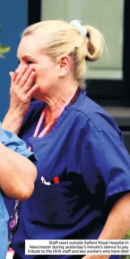  ??  ?? Staff react outside Salford Royal Hospital in Manchester during yesterday’s minute’s silence to pay tribute to the NHS staff and key workers who have died