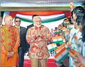  ?? PTI PHOTO ?? ■ Prime Minister Narendra Modi meets the Indian community in Jakarta, Indonesia, on Wednesday.