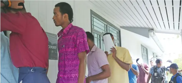  ?? Photo: Kelera Sovasiga ?? The accused from Lami, who were charged with breaching COVID-19 restrictio­ns by playing touch rugby, appeared at the Suva Magistrate­s Court on May 2, 2020.