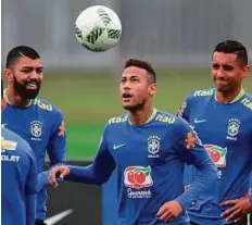  ?? AFP ?? Brazil’s Neymar (centre), Marquinhos (right) and Gabriel take part in a training session ahead of the Rio Games.