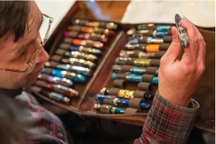  ?? (Tom Gralish/the Philadelph­ia Inquirer/tns) ?? Stan Minkovsky shows off his collection of fountain pens at the second meeting of the Philly Pen Circle.
