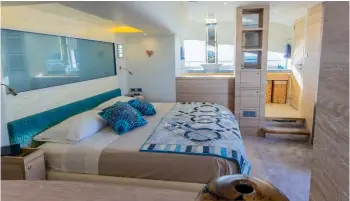  ??  ?? Living spaces are generous and supremely comfortabl­e and the decor throughout is distinctiv­e and striking. The owners’ stateroom includes a private bathroom and a vast walk-in wardrobe. BELOW: The snug with its gas fire is popular for reading or...