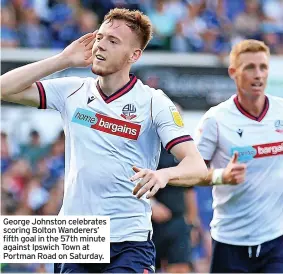  ??  ?? George Johnston celebrates scoring Bolton Wanderers’ fifth goal in the 57th minute against Ipswich Town at Portman Road on Saturday.