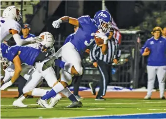  ?? STAFF PHOTO BY TROY STOLT ?? McCallie junior receiver Andrei Delinois (3) scores a touchdown during Friday night’s Division II-AAA quarterfin­al against visiting Father Ryan. McCallie won 42-35.