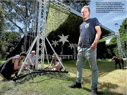  ?? ROBYN EDIE/STUFF ?? Event promoter Matt Turnbull and helpers, from left, Dane Hollands, Alex Lowe and Troy Janson, set up stage equipment for the Base Camp Festival on the Camp Taringatur­a property in central Southland.