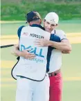  ?? DARREN CARROLL/GETTY ?? Billy Horschel celebrates with his caddie Sunday after winning the World Golf Championsh­ips-Dell Technologi­es Match Play.