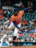  ??  ?? Astros reliever Cristian Javier gave up a sixth-inning solo shot to Kole Calhoun that broke a scoreless tie.