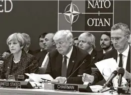  ?? Thierry Charlier /AFP / Getty Images ?? The outcry over President Donald Trump’s supposed abandonmen­t of NATO has been badly overdone. Trump explicitly said in May that the U.S. would not leave allies in the lurch.