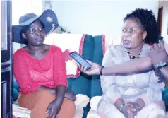  ?? ?? Senator Alice Dube (right) meets Simangele Ndebele who has turned herhome into a place of safety for abandoned and abused children in Tsholotsho