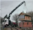  ?? ?? The Spooner Row signalbox craned into its new position at Wymondham Abbey on February 18. MNR