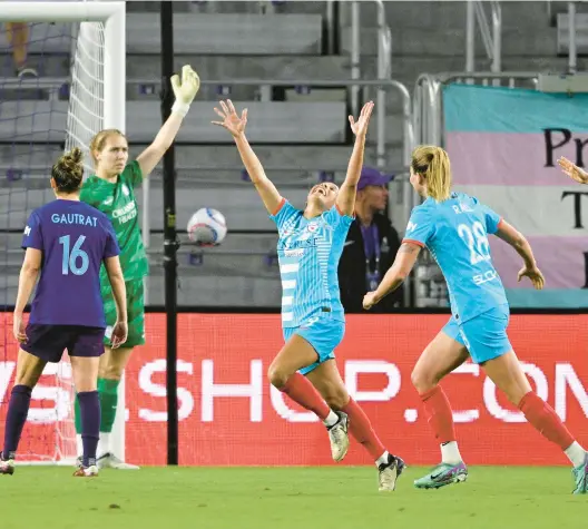  ?? PHELAN M. EBENHACK/AP ?? Red Stars forward Mallory Swanson celebrates her goal during a match against the Pride on Friday in Orlando, Florida.