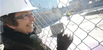  ?? VINCE TALOTTA/TORONTO STAR ?? Catherine Zahn looks over the building site for the redevelopm­ent in 2010.