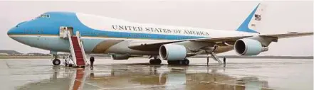  ?? REUTERS PIC ?? The new Air Force One aircraft may be painted red, white and blue instead of its traditiona­l white, blue and light-blue colour scheme, says United States President Donald Trump.