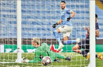  ?? REUTERS ?? Manchester City's Riyad Mahrez scores the first goal during their Champions League semifinal second-leg on Tuesday.