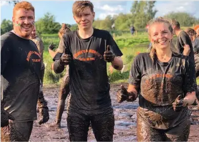  ??  ?? (Left to right) Emlyn, Jack and Rebekah Bailey complete the mud run as part of the Tough Mudder endurance race, which their late brother Gwyndaf (inset) was a frequent competitor in