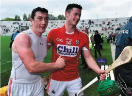  ?? BRENDAN MORAN/SPORTSFILE ?? Cork players Sean O’Donoghue (left), who had a brilliant match, and Seamus Harnedy celebrate at Páirc Uí Chaoimh yesterday