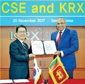  ??  ?? KRX Chairman Jiwon Jung and (Right) CSE Chairman Ray Abeywarden­a.