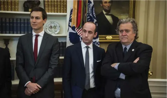  ?? JABIN BOTSFORD/THE WASHINGTON POST FILE PHOTO ?? THE COURTIERS: From left, son-in-law Jared Kushner, Stephen Miller and Stephen Bannon. The trio of close advisers has alternatel­y vied for more influence over their oft-distracted patron.