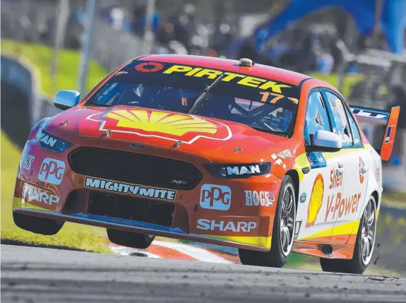  ?? Pictures: GETTY IMAGES/MARK HORSBURGH ?? Scott McLaughlin pushes his Ford to the limit during Race 1 at Perth’s Barbagallo Raceway; and (below) celebratin­g after scoring his third race win in a row this season