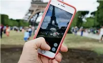  ?? AFP ?? Apps such as Pokemon GO have been used to deprive its developers and Apple itself of reaping legitimate revenues. —