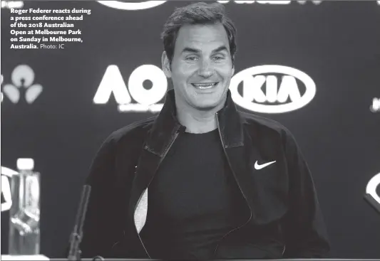  ?? Photo: IC ?? Roger Federer reacts during a press conference ahead of the 2018 Australian Open at Melbourne Park on Sunday in Melbourne, Australia.