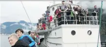  ?? SHARON LINDORES ?? Passengers onboard the MV Uchuck III scan the waters and surroundin­g area looking for whales, sea lions and bald eagles.