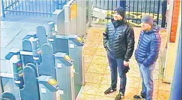  ?? — AFP photos ?? A handout picture taken at Salisbury train station in Salisbury, west of London and released by the British Metropolit­an Police Service in London shows Petrov (R) and Boshirov who are wanted by British police in connection with the nerve agent attack on Skripal and his daughter Yulia.