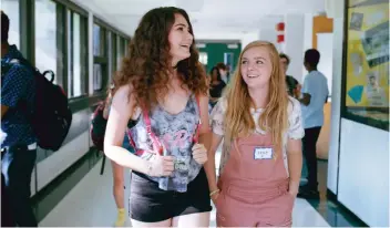  ?? ELEVATION PICTURES ?? Emily Robinson, left, and Elsie Fisher star in Eighth Grade, now streaming on Netflix.